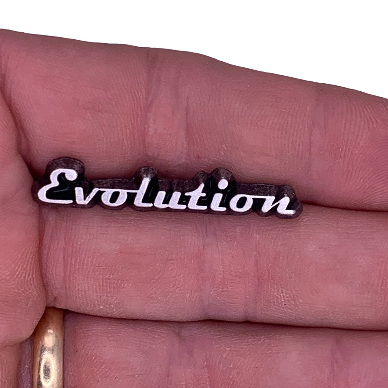 Evolution Engine Lapel Pin
